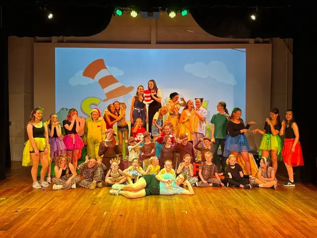 The full Born To Be cast on stage at the end of a show