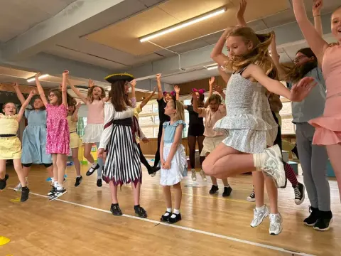 Junior students rehearsing a routine in the studio