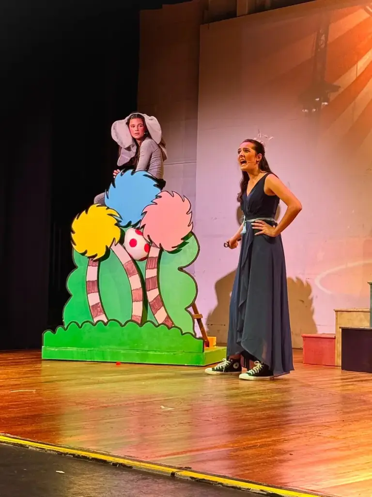 A senior student performing a solo